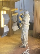 Picture1 person painting with sprayer